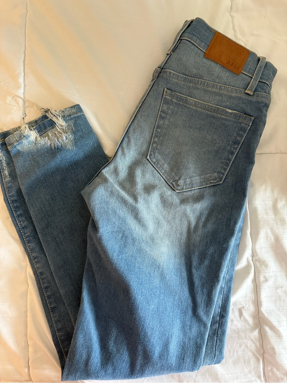 Able Women's Medium Blue Skinny Jeans with Distressed Hem